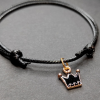  Fekete zsinórszövet karkötő fekete tűzzománc korona charmmal