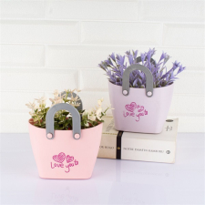 IRIS IRIS E5534 dekoráció művirággal táskában 11,5x14cm party kellék