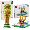 LEGO ® Editions A FIFA labdarúgó-világbajnokság™ hivatalos trófeája 43020 + LEGO® Editions Lionel Messi – A futball legjobb pillanatai 43011