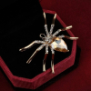 MariaKing Arany színű Pókos bross mesterséges kristállyal