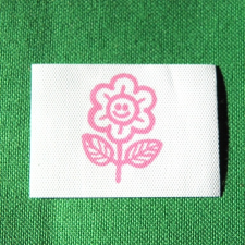 Sticker Ovis jel, nyomott varrható címke - virág rövidáru