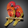 Swarovski Arannyal bevont exkluzív papagájpár bross piros színű Swarovski kristályokkal (1278.)